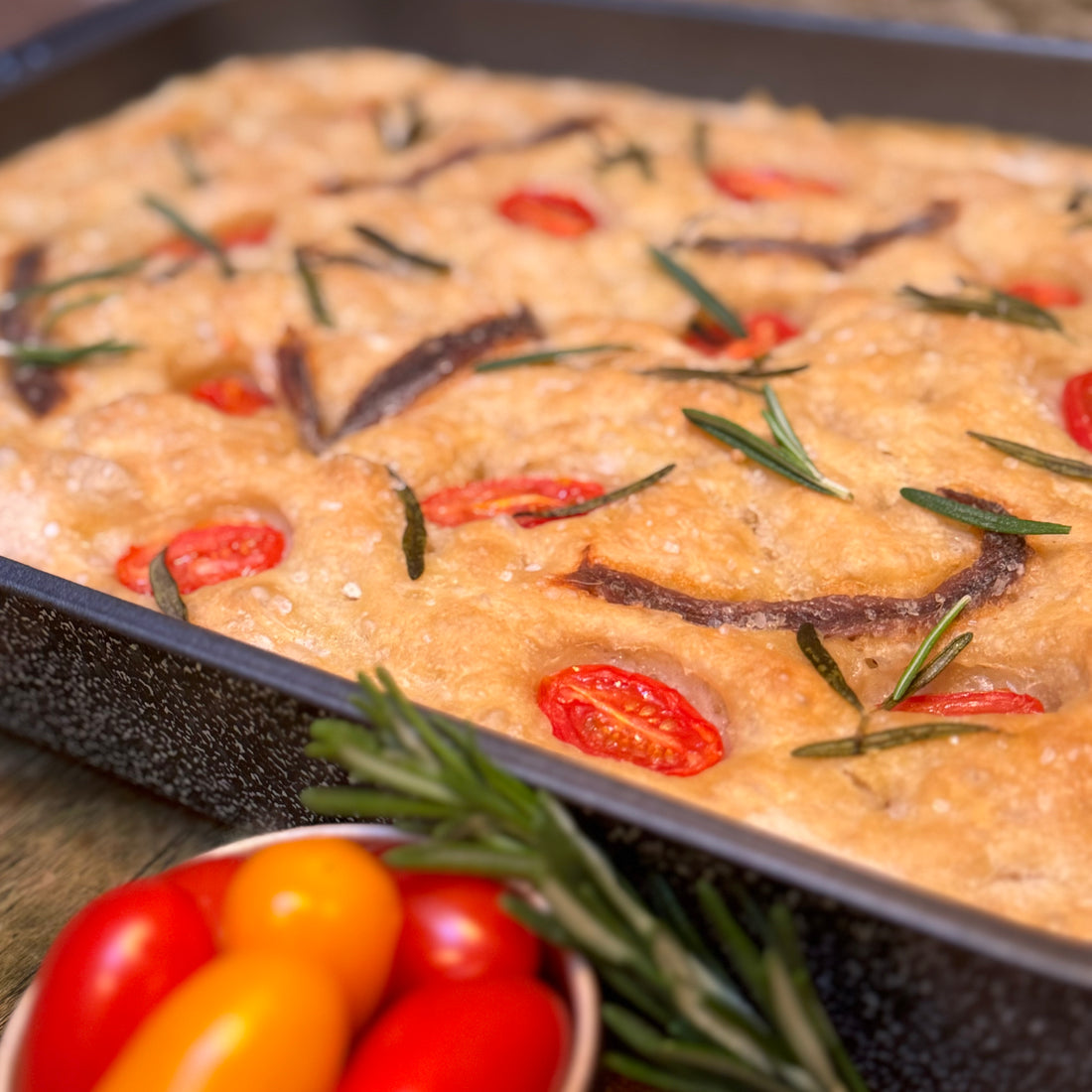 Focaccia with tomatoes and anchovy