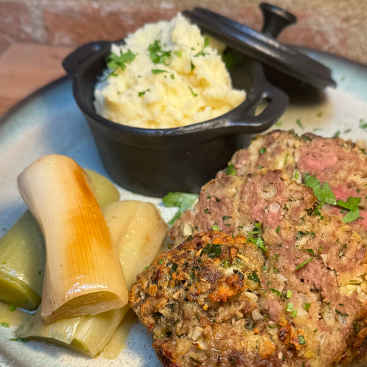 Meatloaf with mash and stewed leek