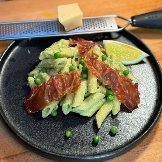 Creamy ricotta pea pasta with crispy prosciutto